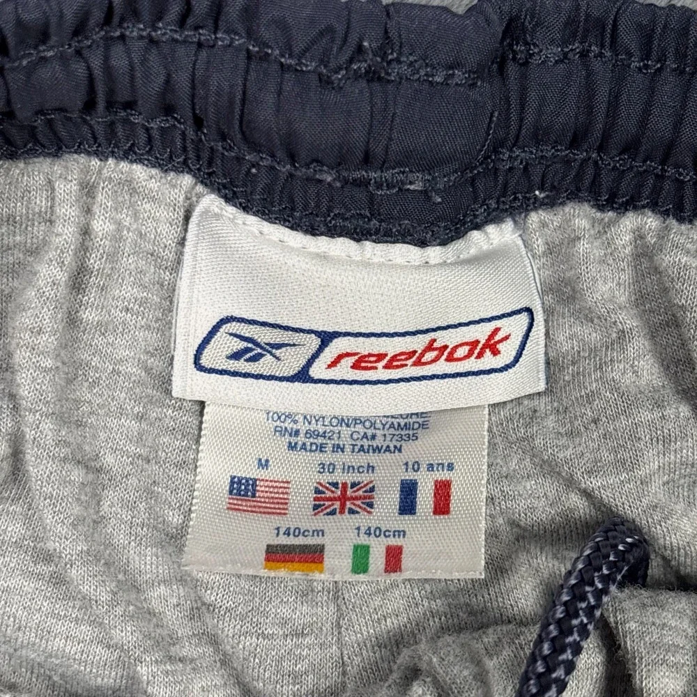 Vintage Reebok Boys Navy Nylon Windbreaker Track Pants White Stripe Size M 10
